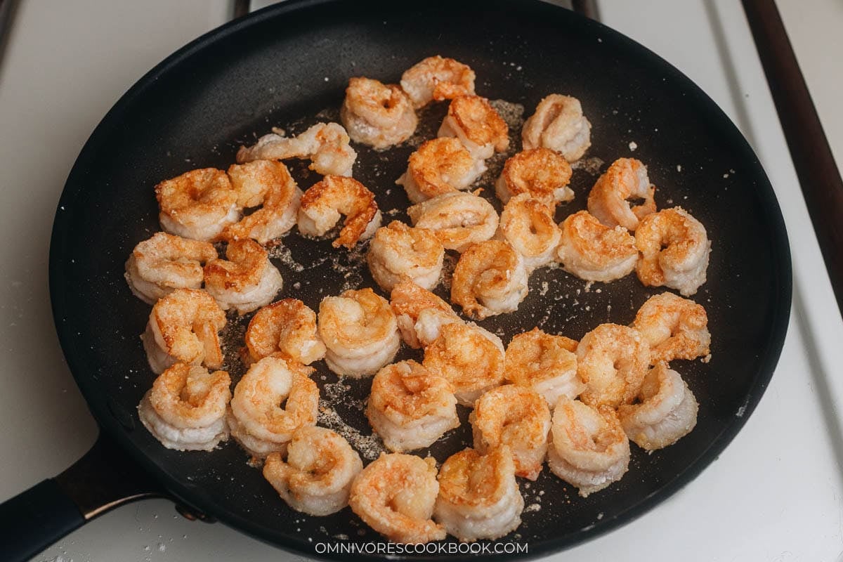 cooking shrimp on a pan