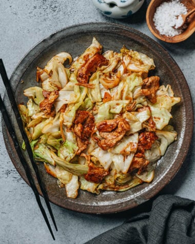 Pork and cabbage stir fry in a plate