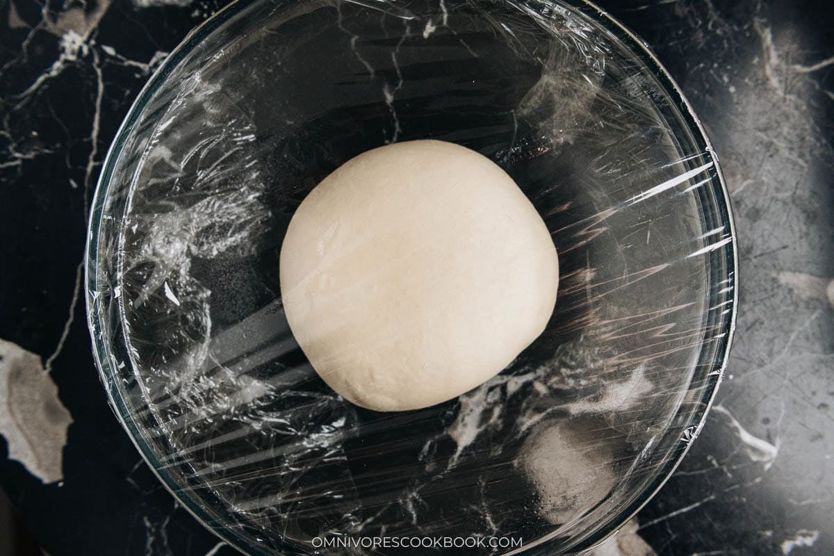 rising the dough in a bowl