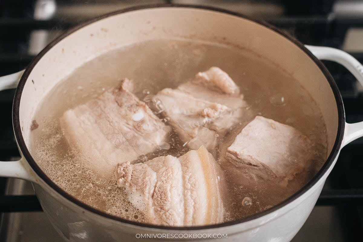 Blanch the pork in a pot