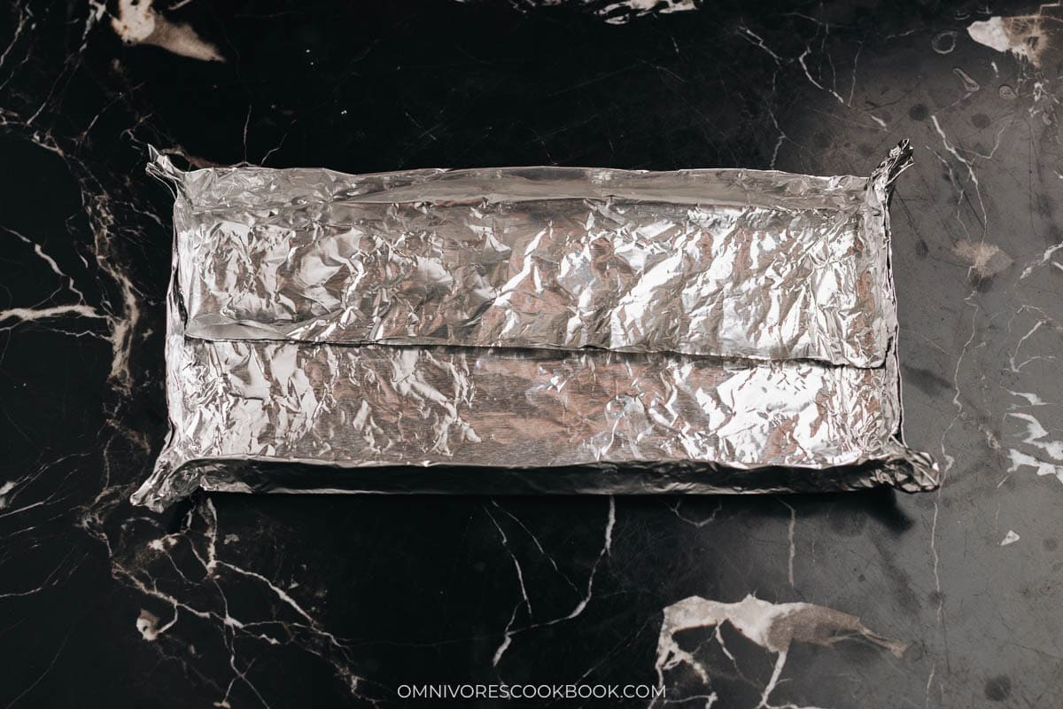 Make two foil pans so you can bake both pineapple cakes at the same time