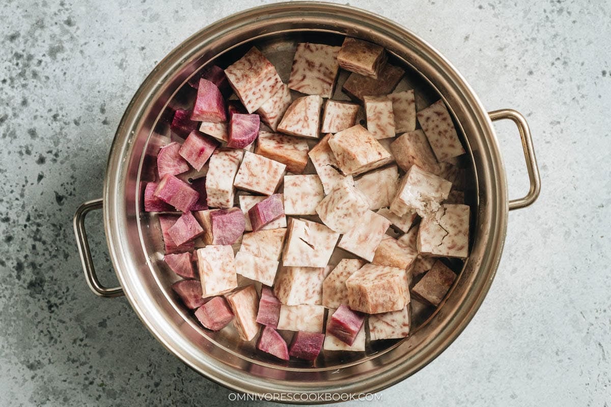 taro and sweet potato cubes in a pan