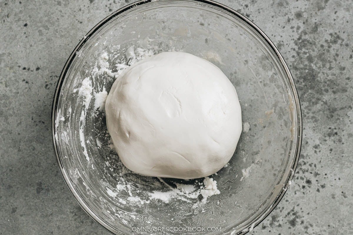 kneaded dough in a bowl