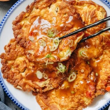 Egg foo young with gravy on rice