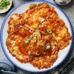 Egg foo young with gravy on rice
