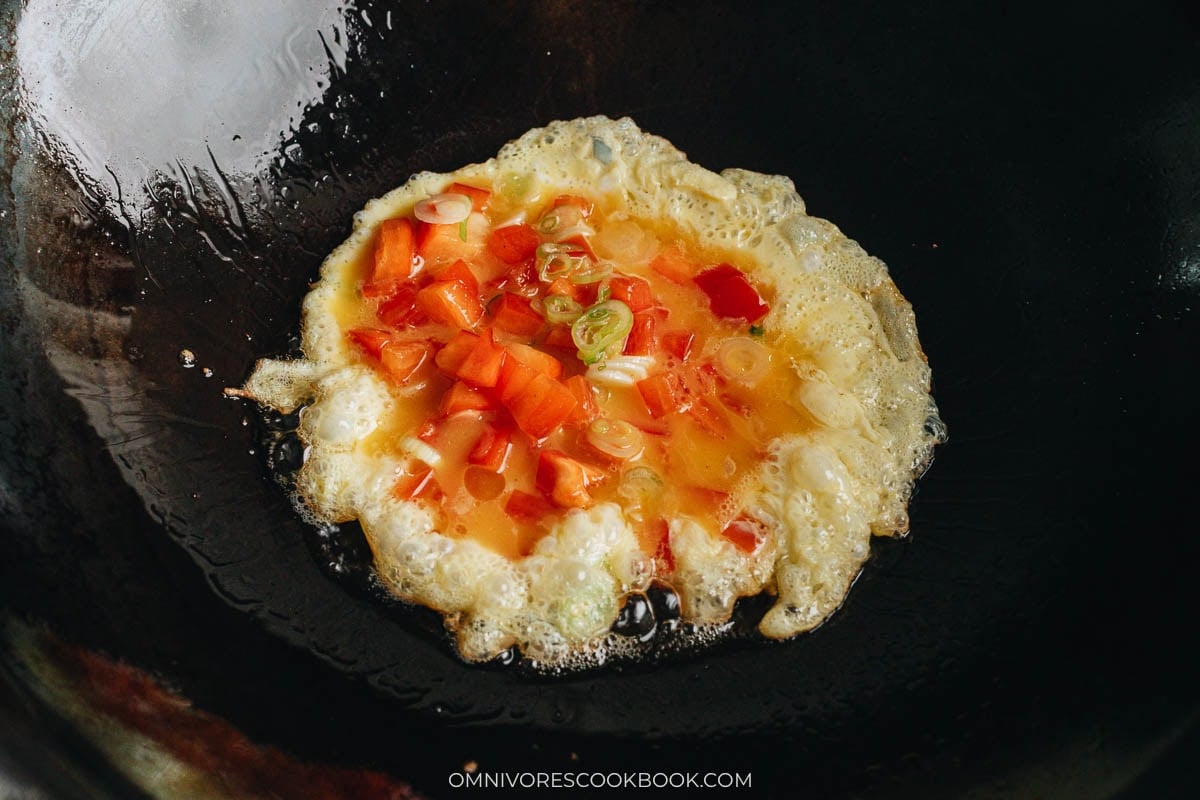 cooking the omelet in a pan