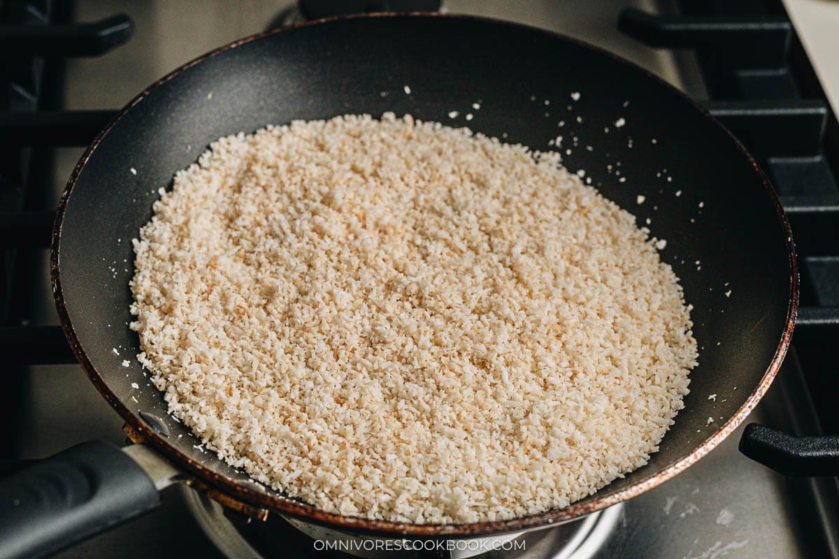 Toasting the coconut in a pan