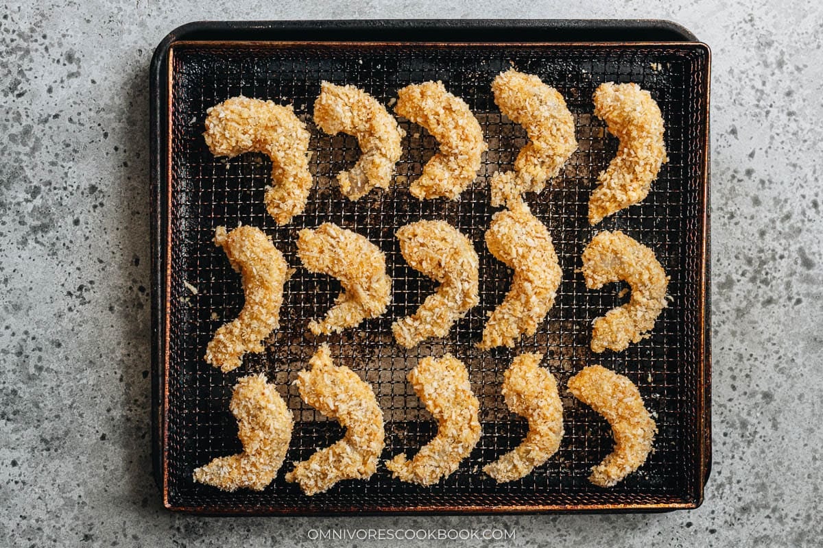 coated shrimp on a sheet tray