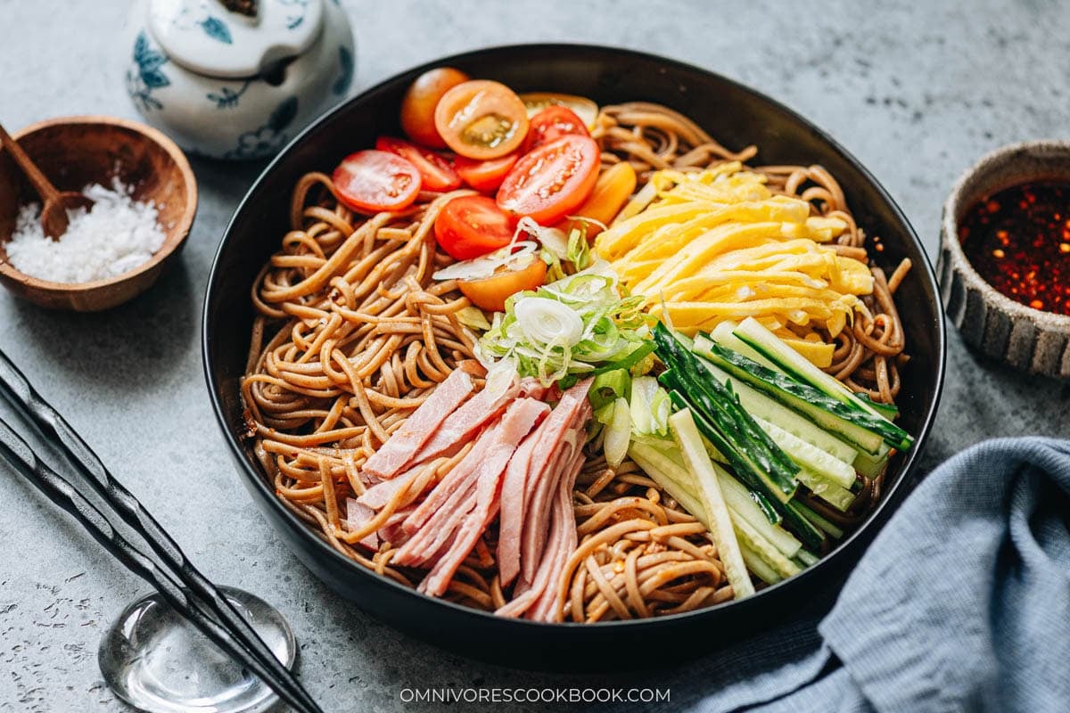 Chinese Buckwheat Noodle Salad served in a black bowl