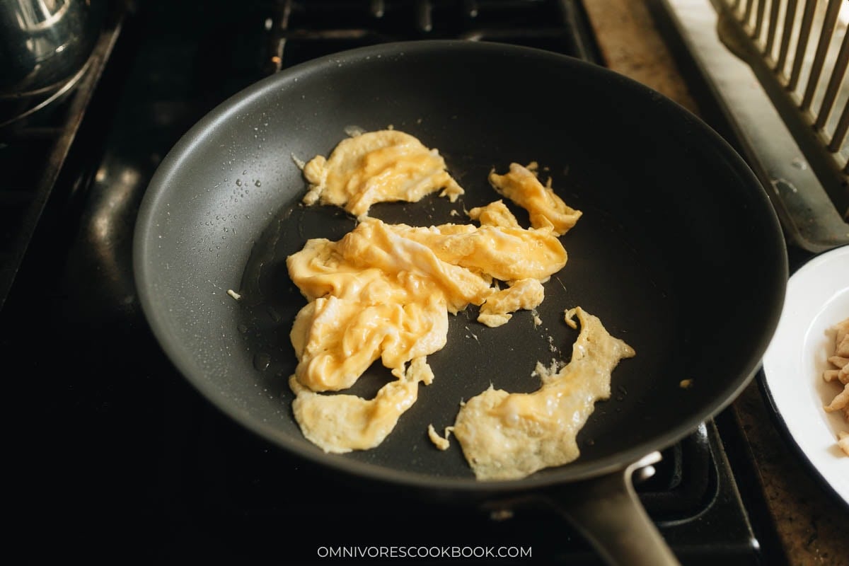 Beaten egg scrambled in the pan
