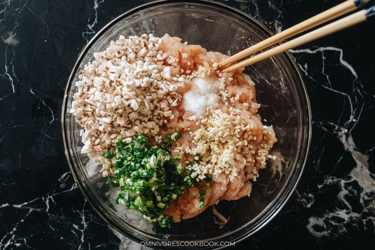 Ground chicken mixed with shiitake and green onion into a sticky meatball paste