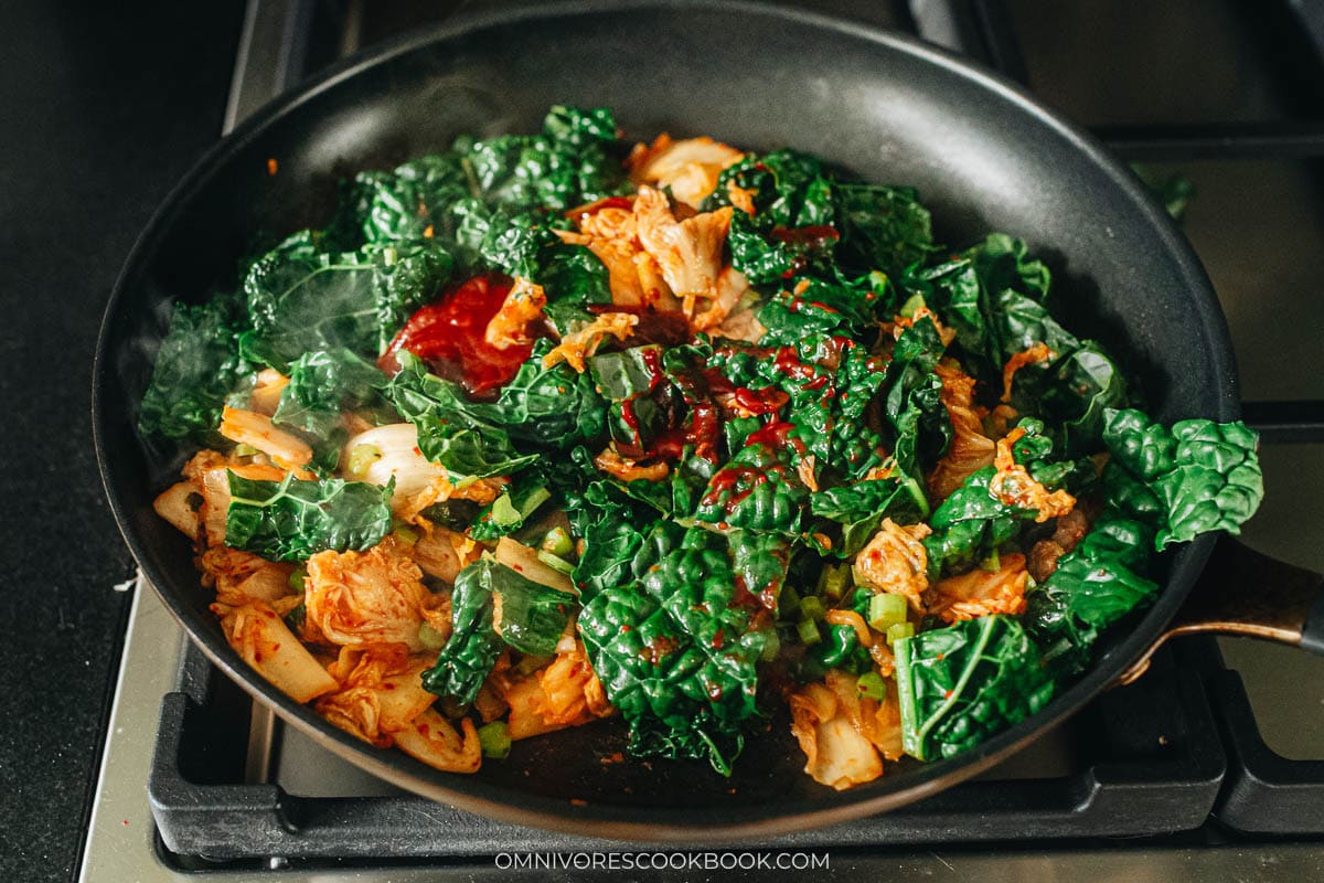 adding the sauce to the pan