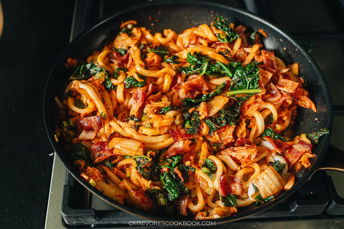 tossing all ingredients together 