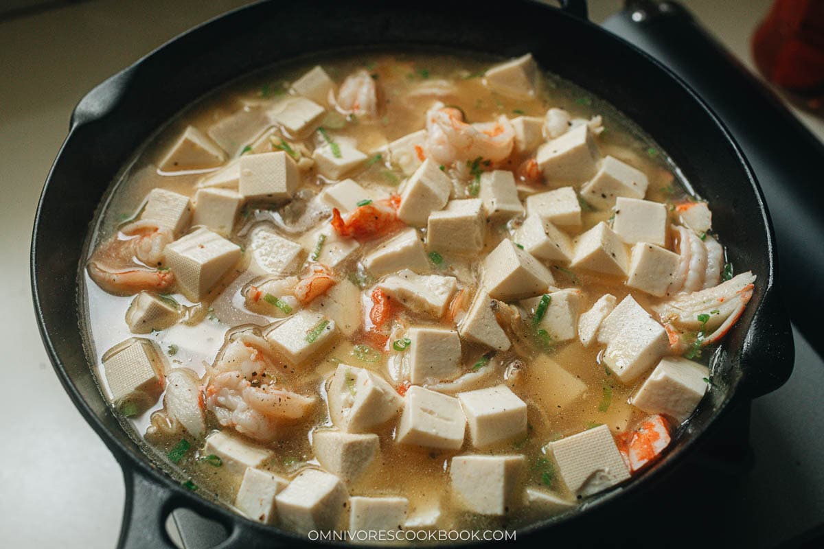 Add the broth and tofu and bring to a boil