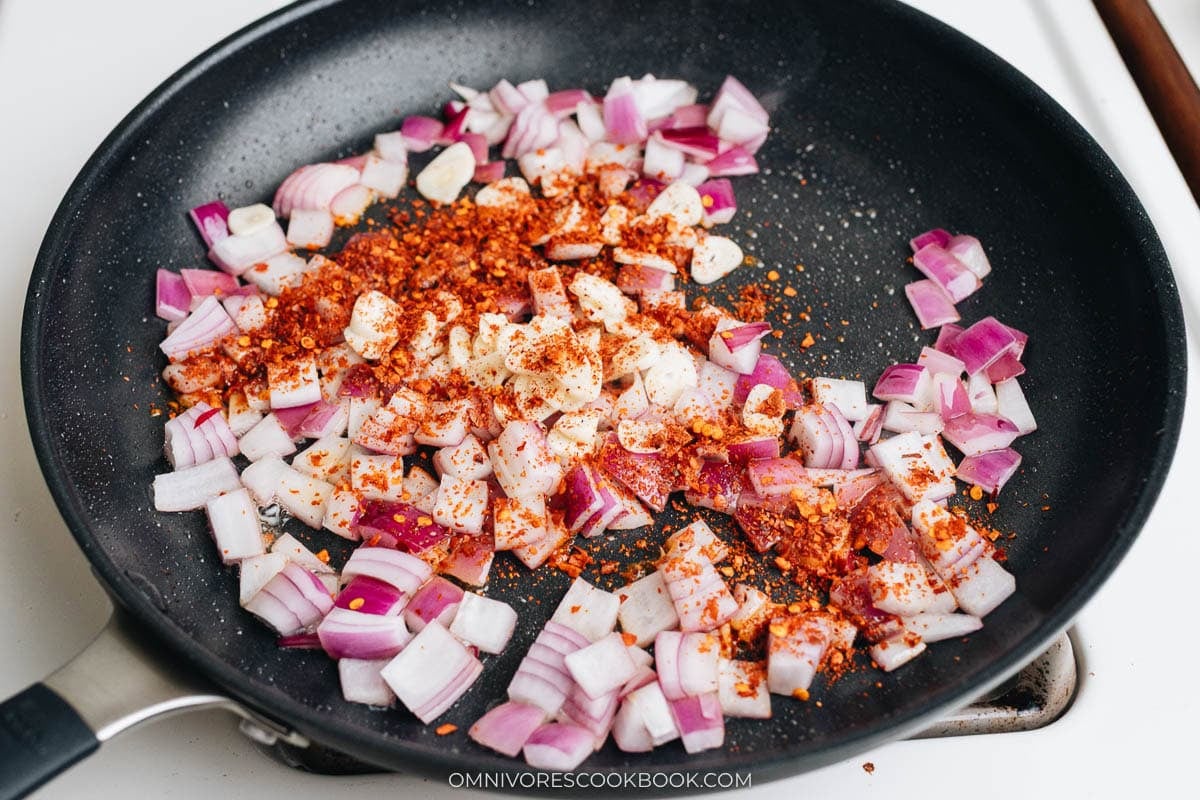 Garlic and Chinese chili flakes toasting for the lamb sauce