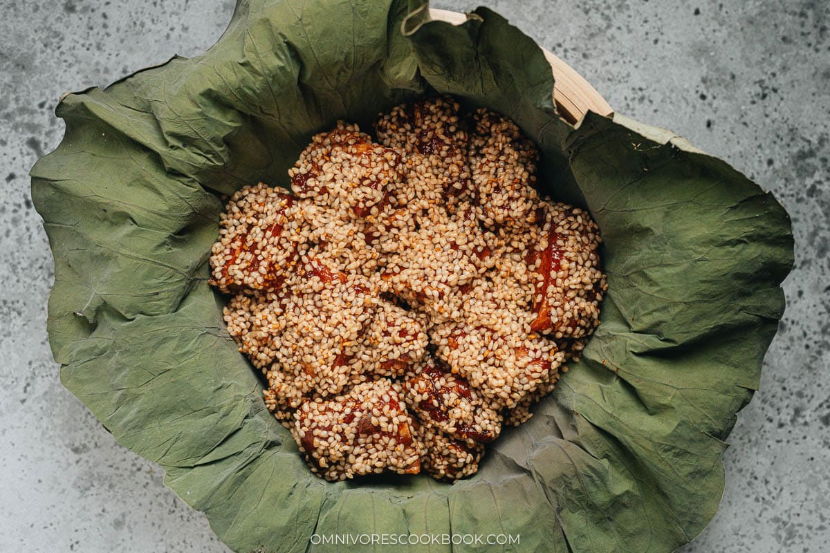 seasoned sticky rice in a lined steamer