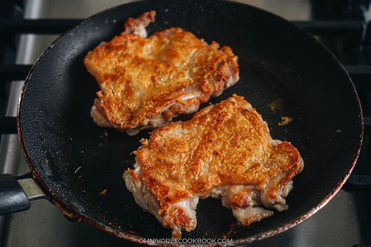  Teriyaki chicken flipped to brown the meat side in the skillet