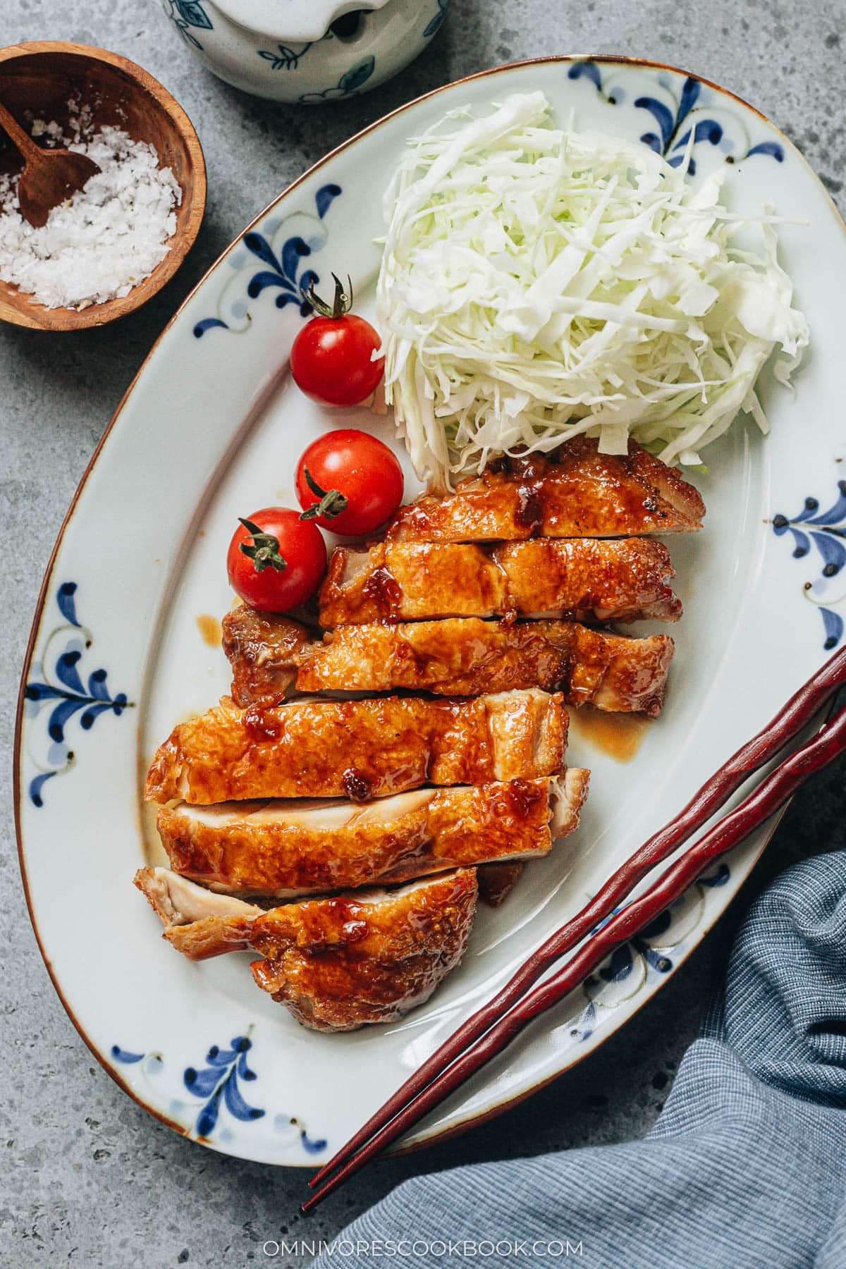 Japanese teriyaki chicken sliced with side cabbage